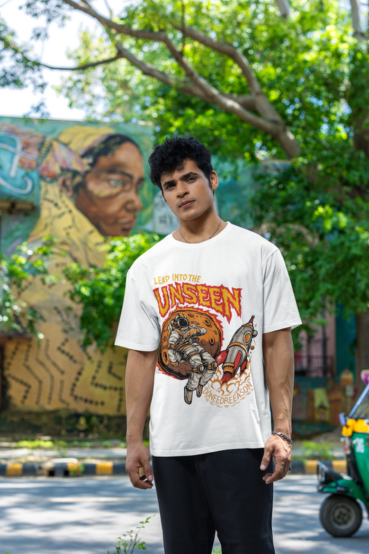 Oversized White T-Shirt with Astronaut & Rocket Graphic – Leap into the Unseen Streetwear Tee.